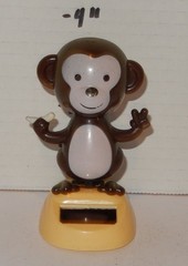 Solar Powered Monkey With Banana Animal Brown