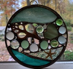 stained glass ocean sun catcher with hearts, shells , and starfish