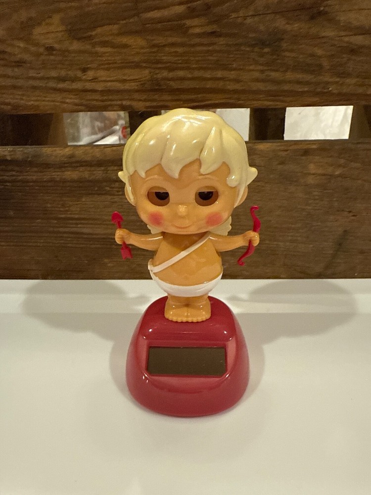 Solar Powered Bobble Head Dancing Cupid With Bow And Arrow