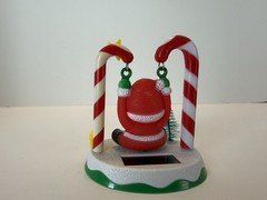 Solar Dancer Shaker Santa Clause Swinging On Candy Canes (2015)