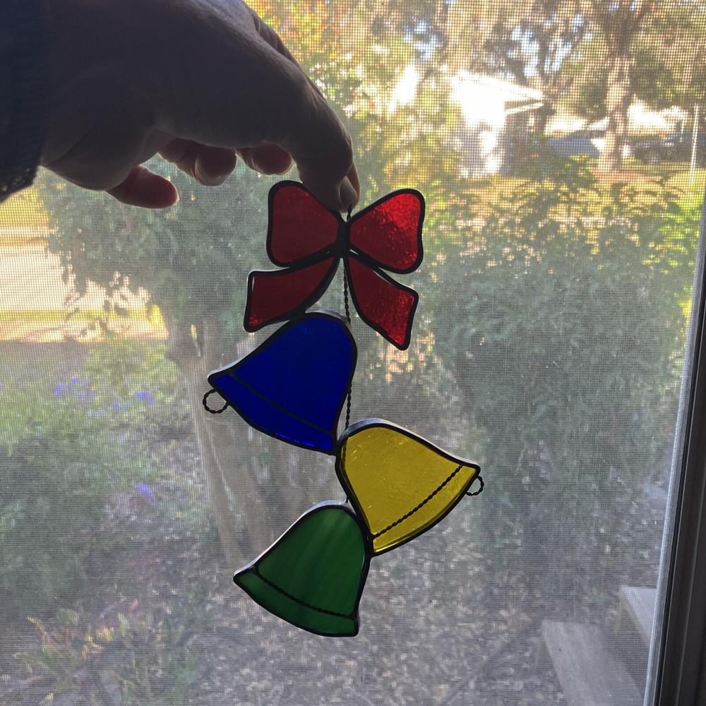 suncatcher Handmade Christmas ornament stained glass bells, and bow. 7 1/2 “