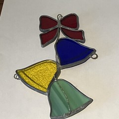 suncatcher Handmade Christmas ornament stained glass bells, and bow. 7 1/2 “