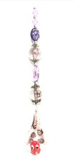 Lamp work glass octopus suncatcher w/ purple & clear glass beads. Nautical ocean