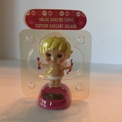 Dancing Cupid Blinking Eyes Dances Under Bright Lights Bobble Solar Powered