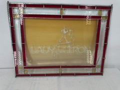 Lady of Iron Stained Glass 24″ x 19″