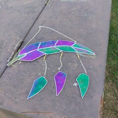 A Glass Stained Feather Hanging Spinners