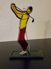 Stained Glass Golfer Swinging with Yellow Shirt and red Pants figure statue