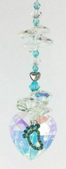 Baby shower christening memorial gift. Crystal suncatcher heart with baby foot