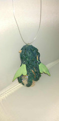 fairy floating on a bubble green with roses handcrafted art