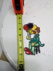 suncatcher clown sitting with balloons multi colored