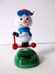 Solar Powered Dancing Snowman Rockin On Scooter Bobble Head