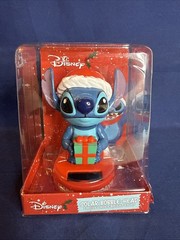 Disney~ Solar Classic Christmas Stitch sunlight bobble head ~ Gift & Santa hat
