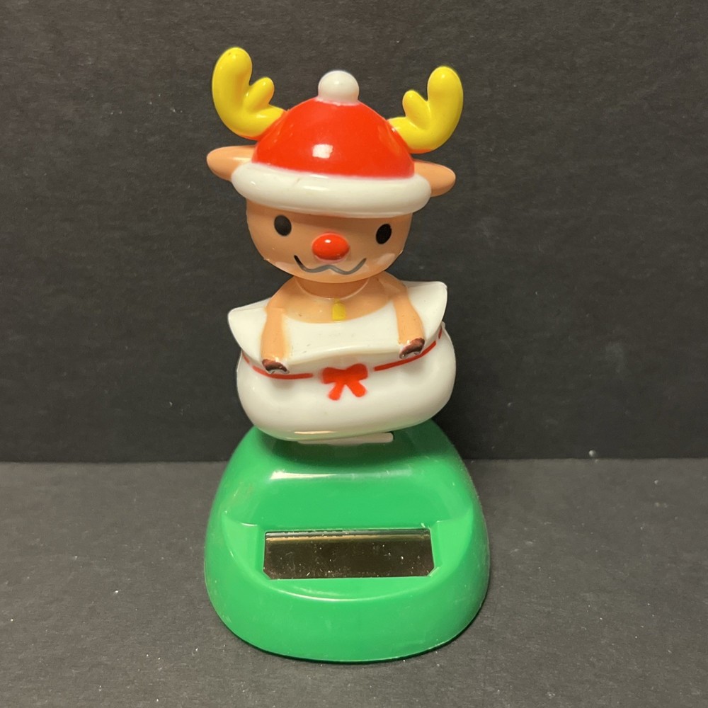 Solar Powered Dancing Toy New – Christmas Reindeer In Santa Sac From Japan