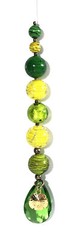 Green & yellow fractured glass bead suncatcher w/ gold sand dollar. Nautical