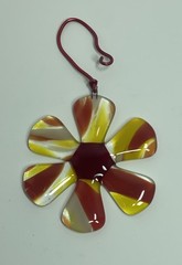 Glass Retro Flower Suncatcher with Abstract Petals In Shades of Red Yellow.