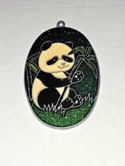 1980s vintage oval stained glass-style suncatcher featuring a panda bear holding