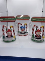 Christmas House Solar Swinging Santa’s And Snowman Set Of 3