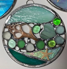 stained glass ocean sun catcher with hearts, shells , and starfish