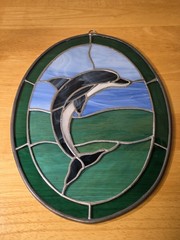 Stained Glass Sun Catcher Blue Dolphin Jumping in Green Ocean 13 x 9.5 oval