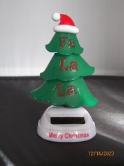 Solar Holiday Style Christmas Tree Fa La La Santa Hat green decorative red white