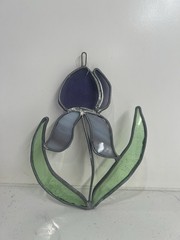 Purple and green stained glass Iris flower