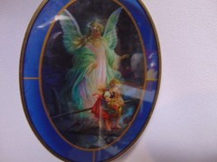 vintage oval-shaped sun catcher guardian angel watching over two children 6.5″