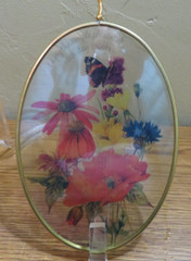 MARJOLEIN BASTIN OVAL GLASS PAINTED SUNCATCHER FLOWERS BUTTERFLY 5.5 X 4 INCHES
