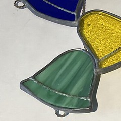 suncatcher Handmade Christmas ornament stained glass bells, and bow. 7 1/2 “