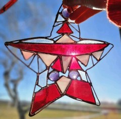 Red purple and pink star stained glass sun catcher