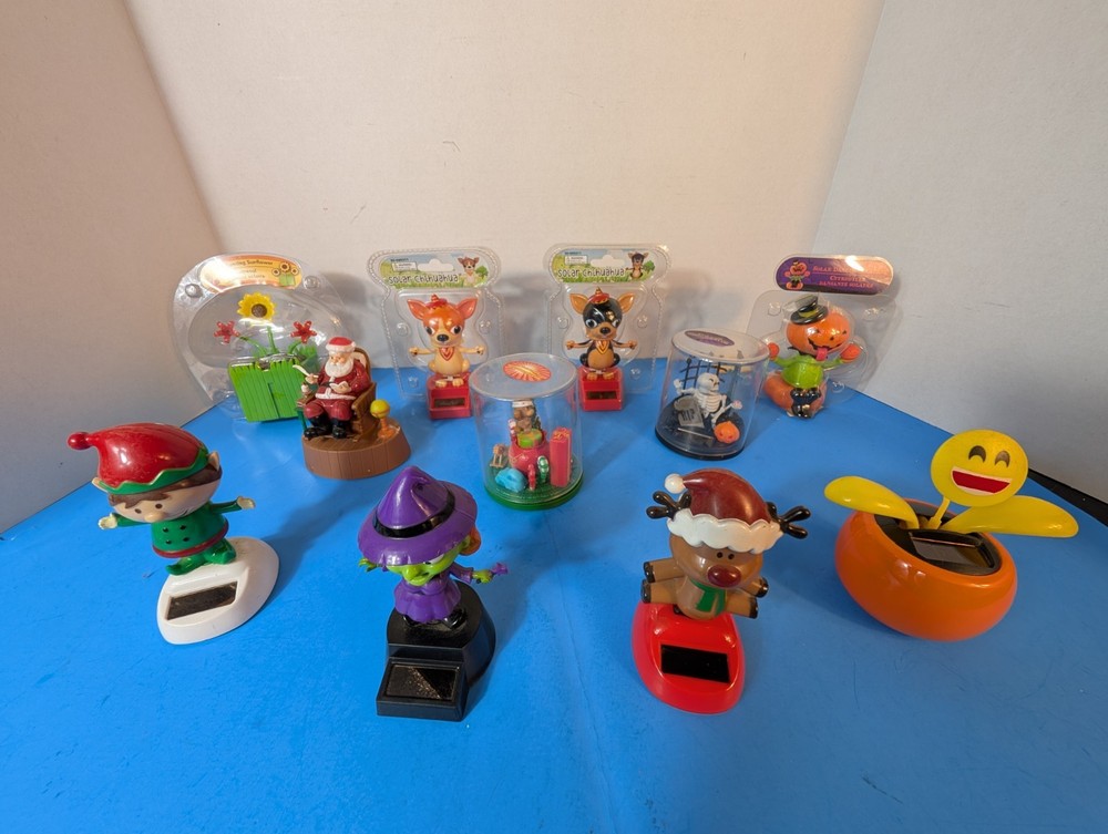 Set of 11 dancing solar powered figures: Santa Claus, Elf, Witch and Jack-o’-lan