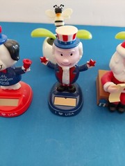 Lot Of 6 Solar Powered Novelty Toys -2 Flowers, Dog, Santa,Uncle Sam & Snowman