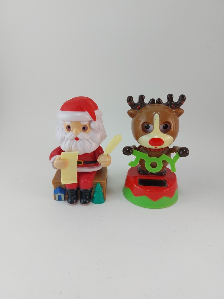 Solar-Powered Christmas Reindeer with Joy & Dancing Santa