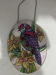 AMIA stained glass suncatcher featuring a Bird and floral design.
