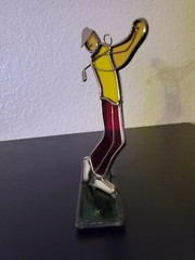 Stained Glass Golfer Swinging with Yellow Shirt and red Pants figure statue