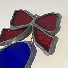 suncatcher Handmade Christmas ornament stained glass bells, and bow. 7 1/2 “