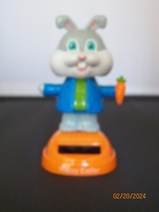 Solar Happy Easter Grey White Rabbit blue coat green button shirt orange carrot