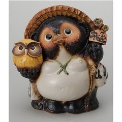 Shigaraki ware 560-01 9th Tanuki with an owl bag. From Japan