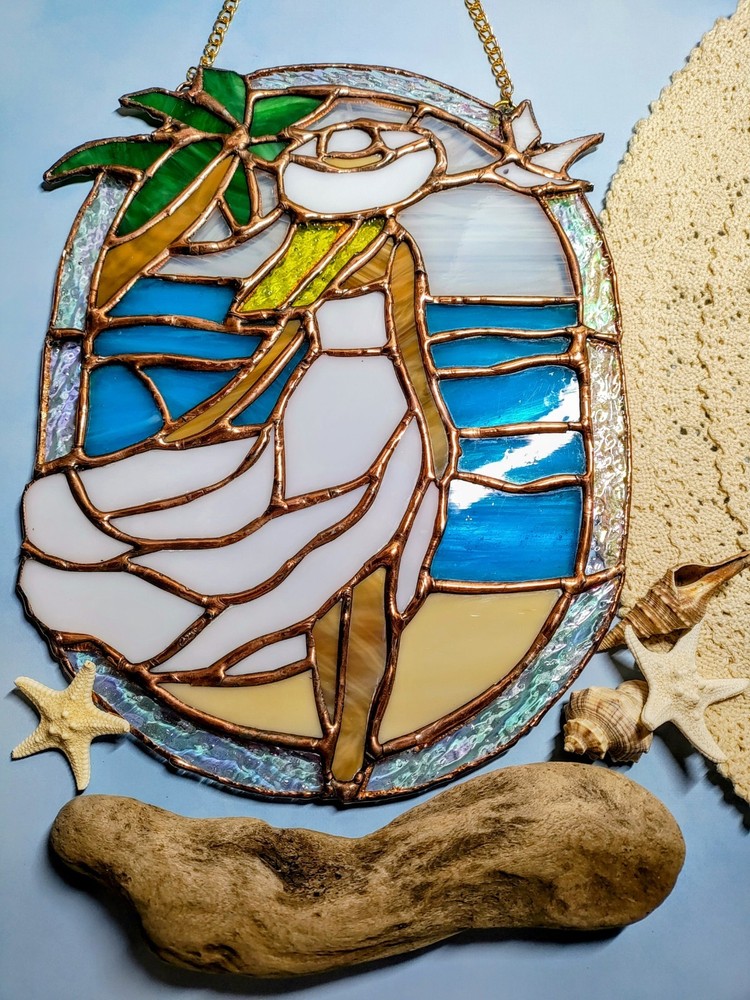Stained Glass beach girl Suncatcher With Vibrant Colors. Measures 9.5 X 7.5.