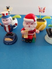 Lot Of 6 Solar Powered Novelty Toys -2 Flowers, Dog, Santa,Uncle Sam & Snowman